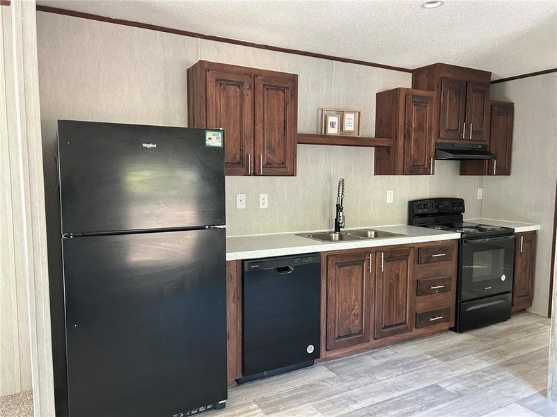 Furnished interior view inside a new home in , Williston (Image 3).