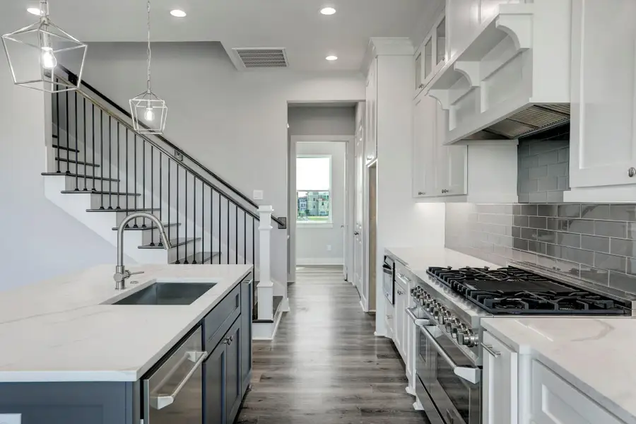 Zline stainless appliances include a microwave, dishwasher, & 6 burner gas range with grill and double oven. Stainless steel sink as well. Zline stainless appliances include a microwave, dishwasher, & 6 burner gas range with grill and double oven. Stainless steel sink as well.