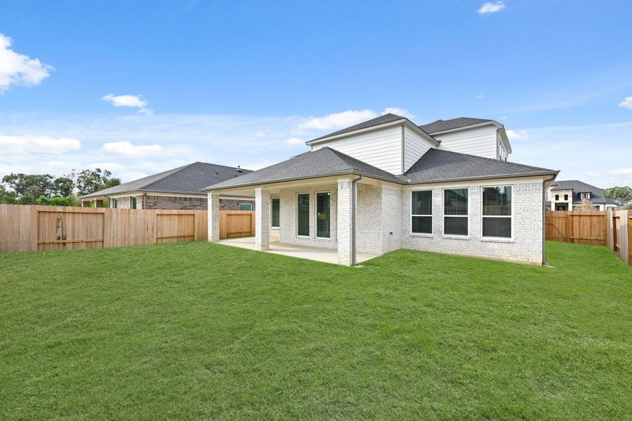 Exterior details and patio area of a home in Barton Creek Ranch, Conroe (Image 21). Exterior details and patio area of a home in Barton Creek Ranch, Conroe (Image 21).