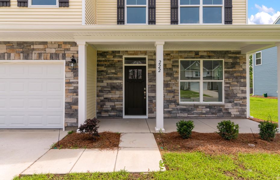 Exterior details and patio area of a home in Parker's Preserve, Ridgeville (Image 2).