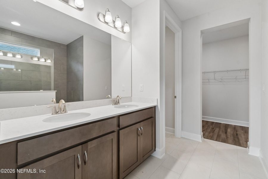 Furnished interior view inside a new home in Tributary 50', Yulee (Image 12).