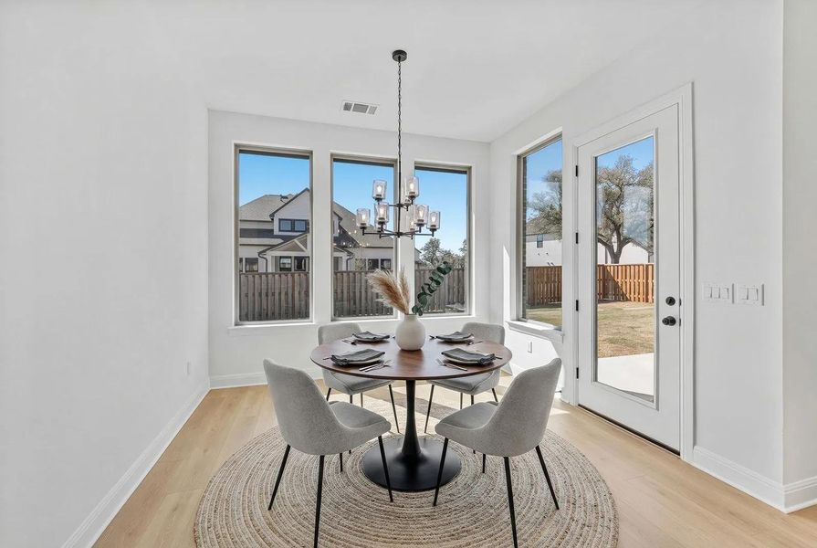 Furnished interior view inside a new home in Parmer Ranch 60, Georgetown (Image 9).