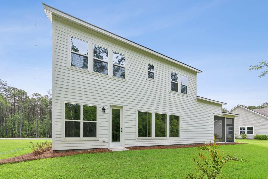 Exterior details and patio area of a home in Hidden Ponds Reserve, Awendaw (Image 3).