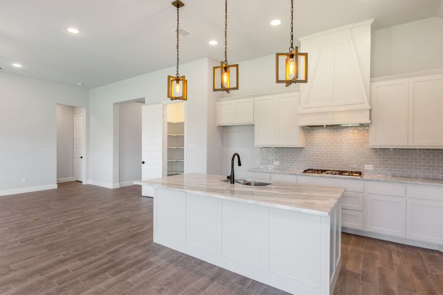 Representative furnished interior of a home built from the Cameron by UnionMain Homes in Cambridge Crossing, Celina (Image 10).