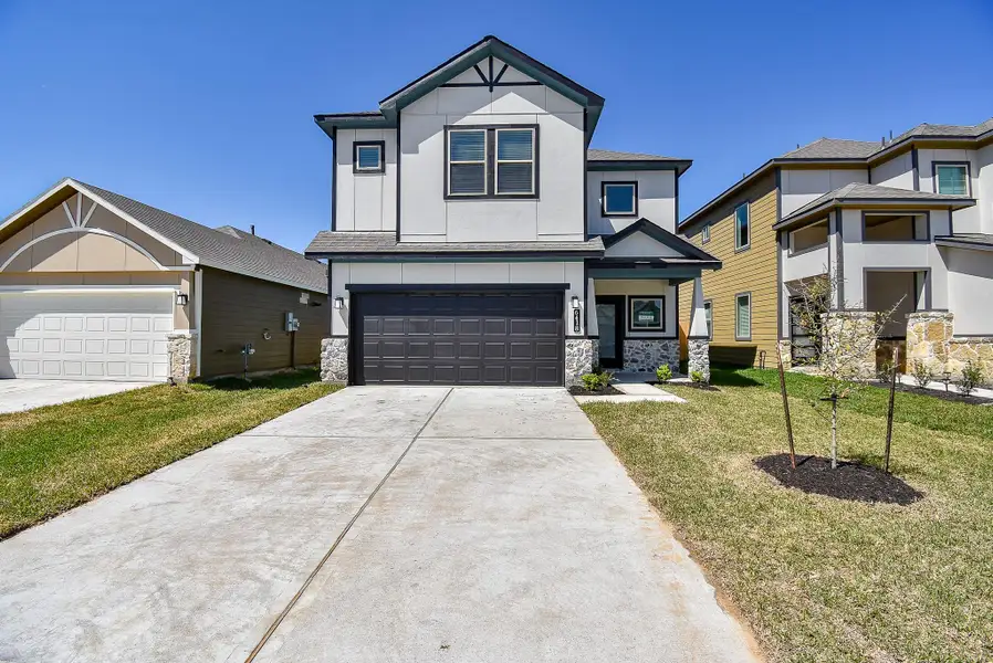 Front exterior of a new home in Glendale Lakes, Arcola, TX, highlighting curb appeal (Image 2).