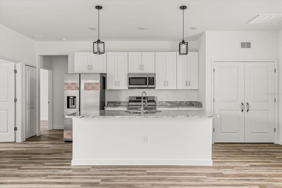 Furnished interior view inside a new home in , Poinciana (Image 9).