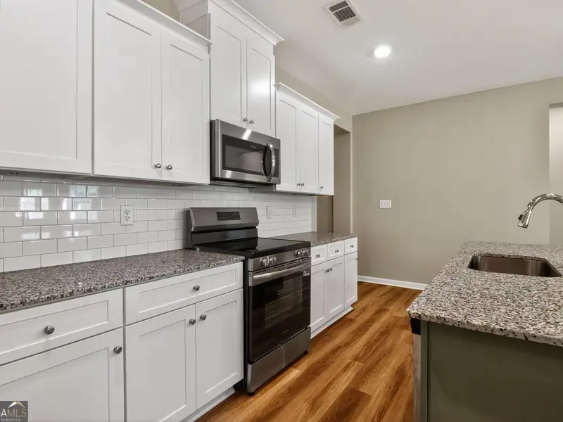 Furnished interior view inside a new home in Ivy Glen, Perry (Image 11).