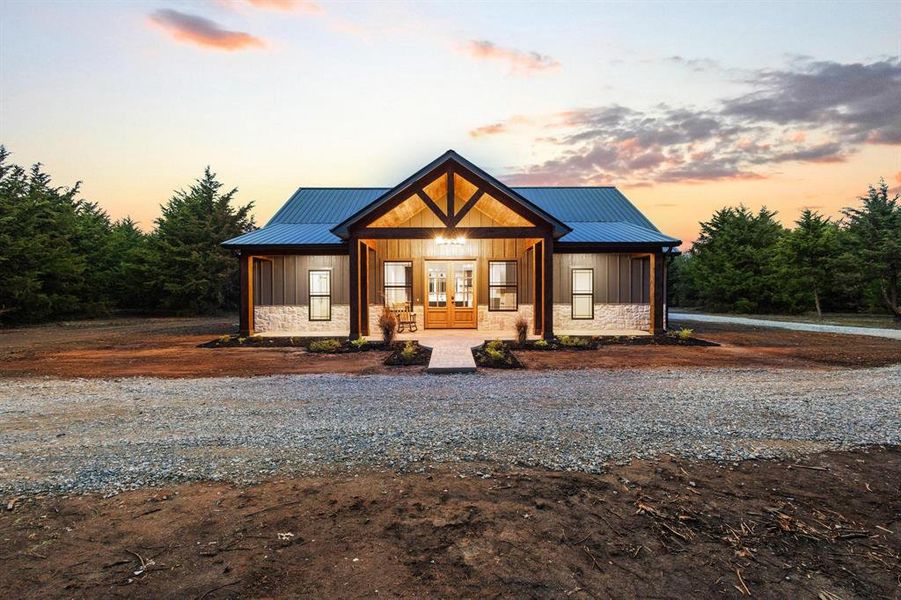 Front exterior of a new home in , Bonham, TX, highlighting curb appeal (Image 24).