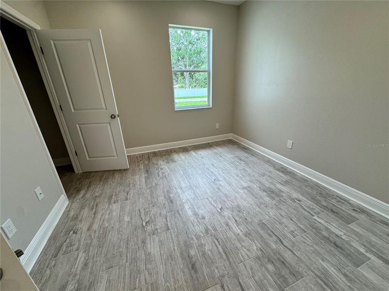 Spacious, unfurnished interior of a new home in , Dade City (Image 60).