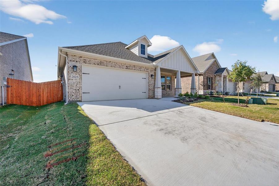 Front exterior of a new home in Northstar, Haslet, TX, highlighting curb appeal (Image 21). Front exterior of a new home in Northstar, Haslet, TX, highlighting curb appeal (Image 21).