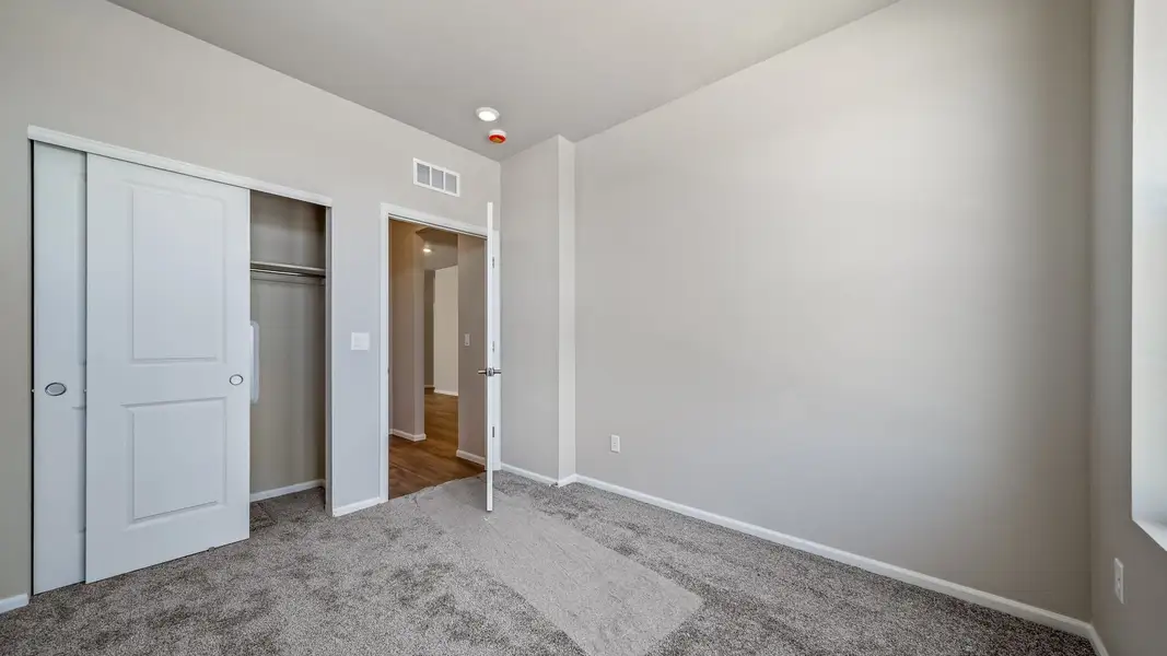 Spacious, unfurnished interior of a new home in The Reserve at Green Valley Ranch, Aurora (Image 25).