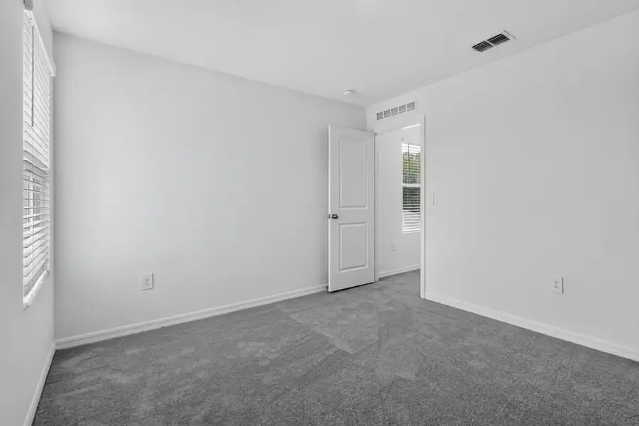 Representative unfurnished interior of a home built from the Kingfisher by Taylor Morrison in Palm Wind, Hudson (Image 14).