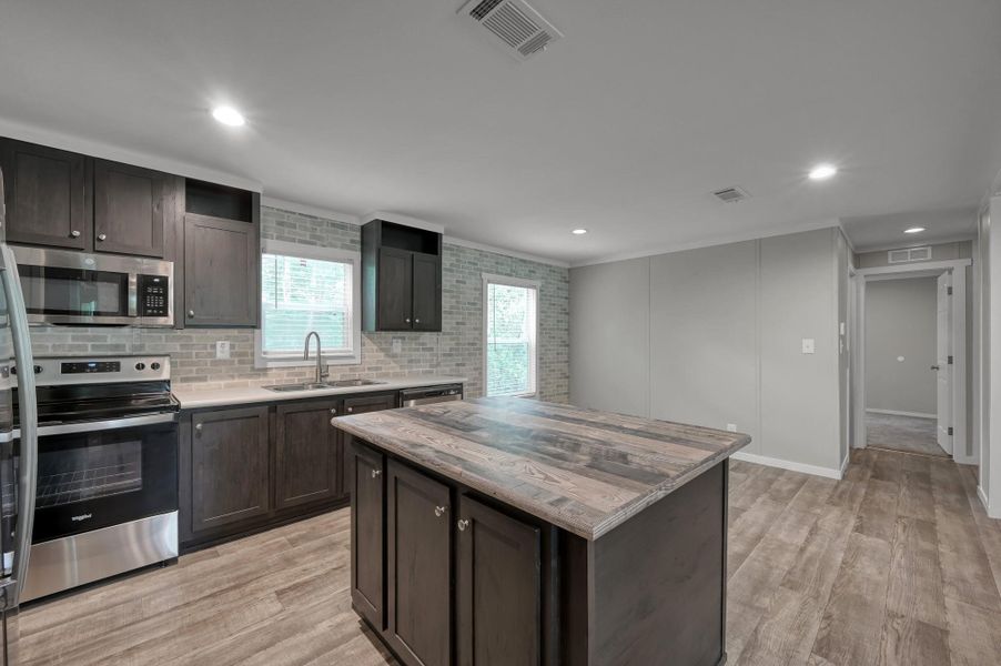 Furnished interior view inside a new home in , New Waverly (Image 3).