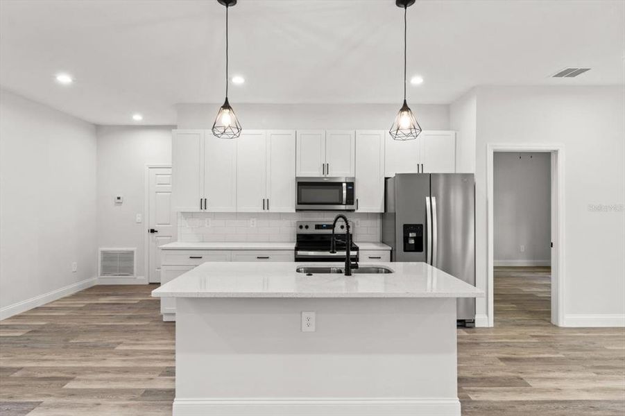Furnished interior view inside a new home in , Dunnellon (Image 8).