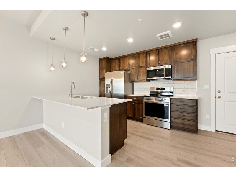 Furnished interior view inside a new home in The Lakes at Centerra, Loveland (Image 26).