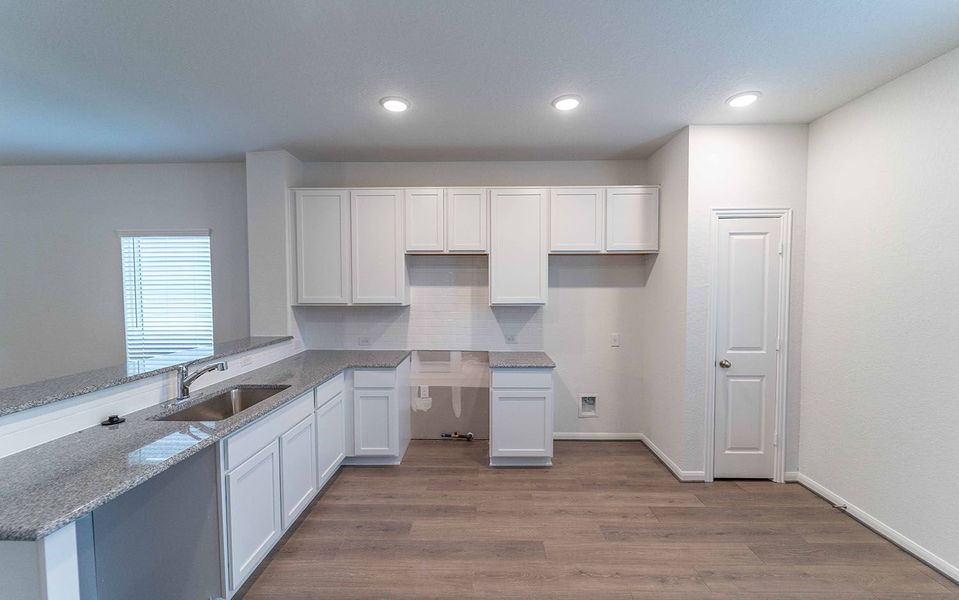 Furnished interior view inside a new home in Hunter's Ranch, San Antonio (Image 4).