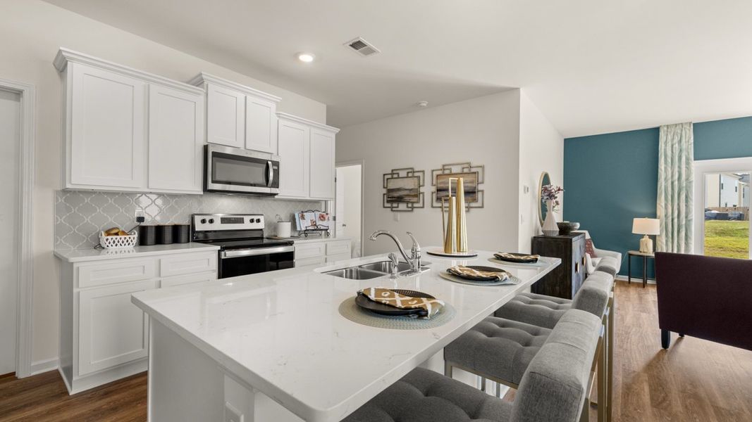 Representative furnished interior of a home built from the Robie by D.R. Horton in Kingston Ranch at Lake Oconee, Buckhead (Image 7).