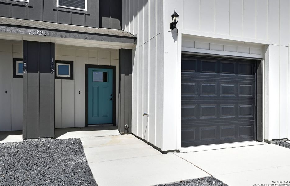 Front exterior of a new home in , San Antonio, TX, highlighting curb appeal (Image 23).