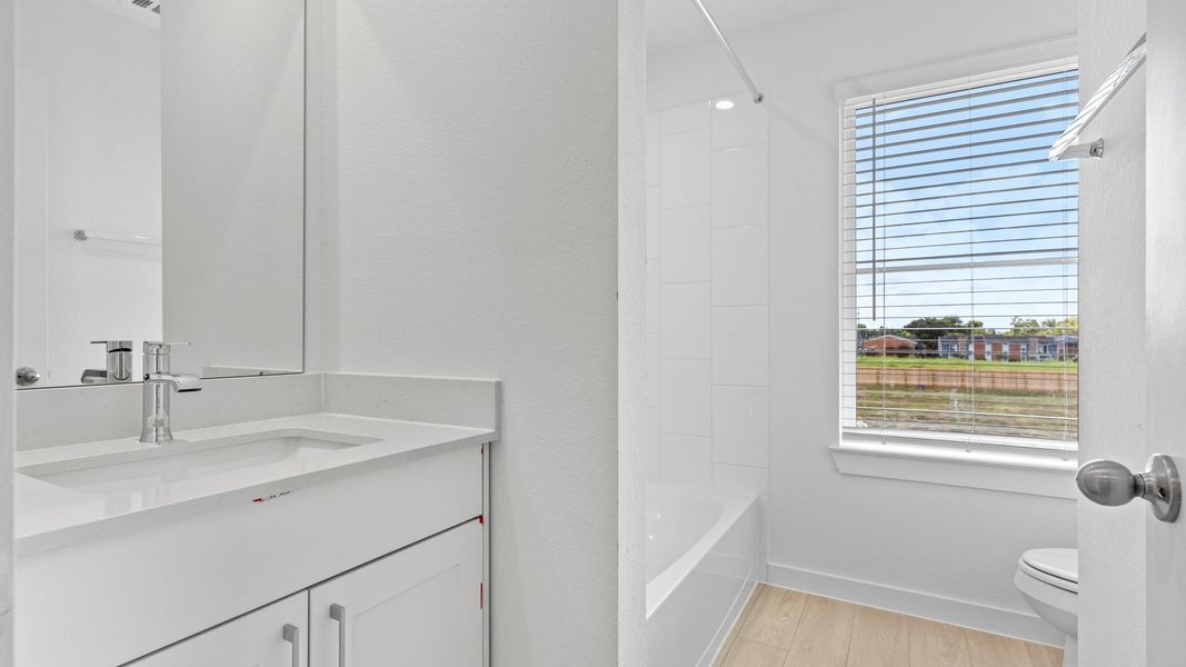 Furnished interior view inside a new home in Lexington Village, Missouri City (Image 15).