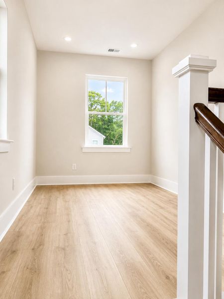 Spacious, unfurnished interior of a new home in Indigo Grove Single Family Homes, Johns Island (Image 18).