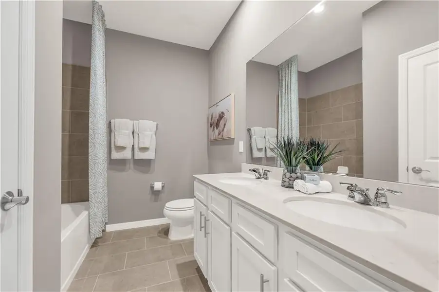 Furnished interior view inside a new home in River Oaks, Locust Grove (Image 27).