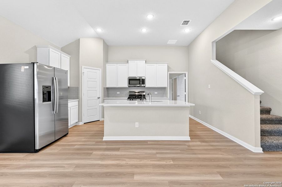 Furnished interior view inside a new home in Winding Brook, San Antonio (Image 8).