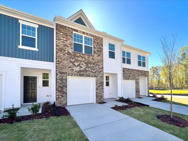 Front exterior of a new home in Halstead, Moncks Corner, SC, highlighting curb appeal (Image 19).