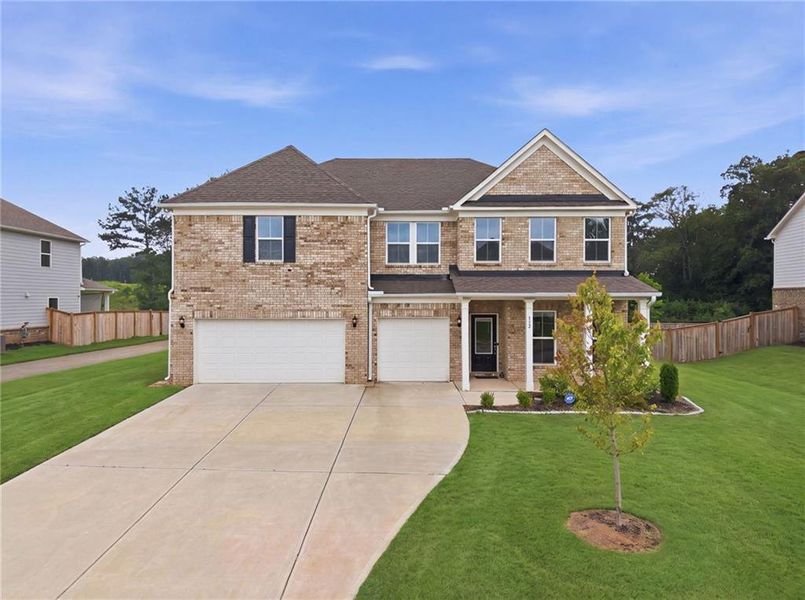 Front exterior of a new home in , McDonough, GA, highlighting curb appeal (Image 29). Front exterior of a new home in , McDonough, GA, highlighting curb appeal (Image 29).