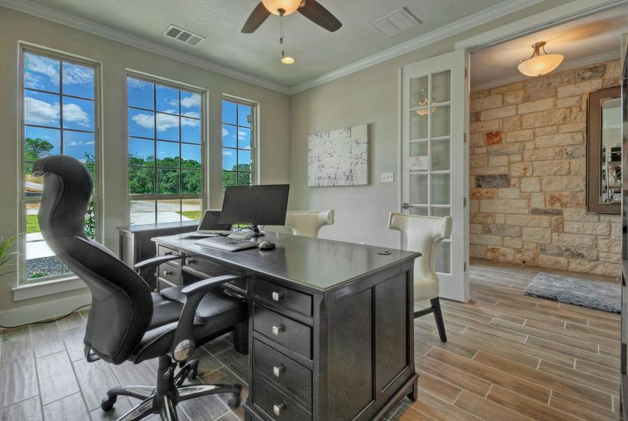 Representative furnished interior of a home built from the Madera II by Giddens Homes in Scofield Farms Estates, Georgetown (Image 148).