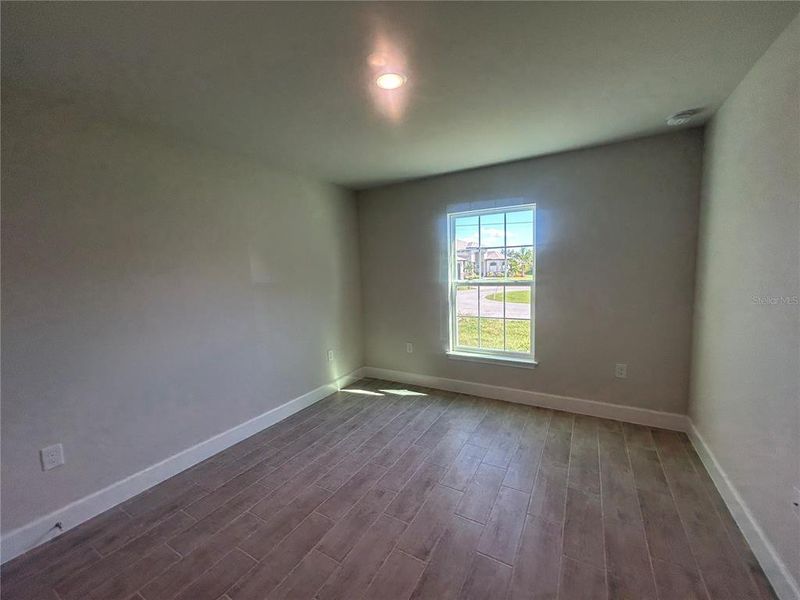 Spacious, unfurnished interior of a new home in Deep Creek, Punta Gorda (Image 22).