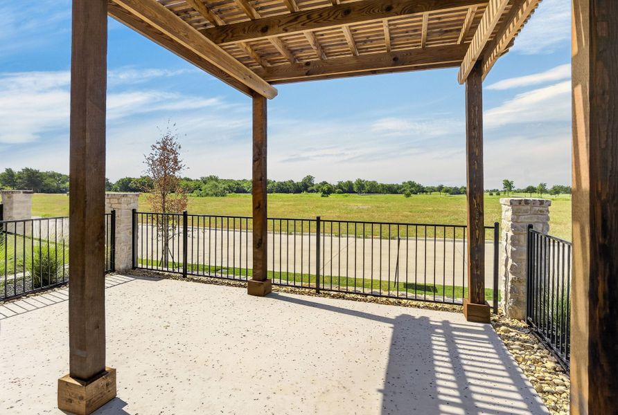 Exterior details and patio area of a home in The Tribute, The Colony (Image 4).