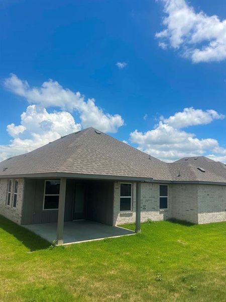 Exterior details and patio area of a home in , Springtown (Image 3).