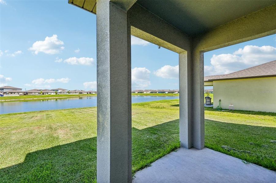Exterior details and patio area of a home in Seaire, Parrish (Image 27).