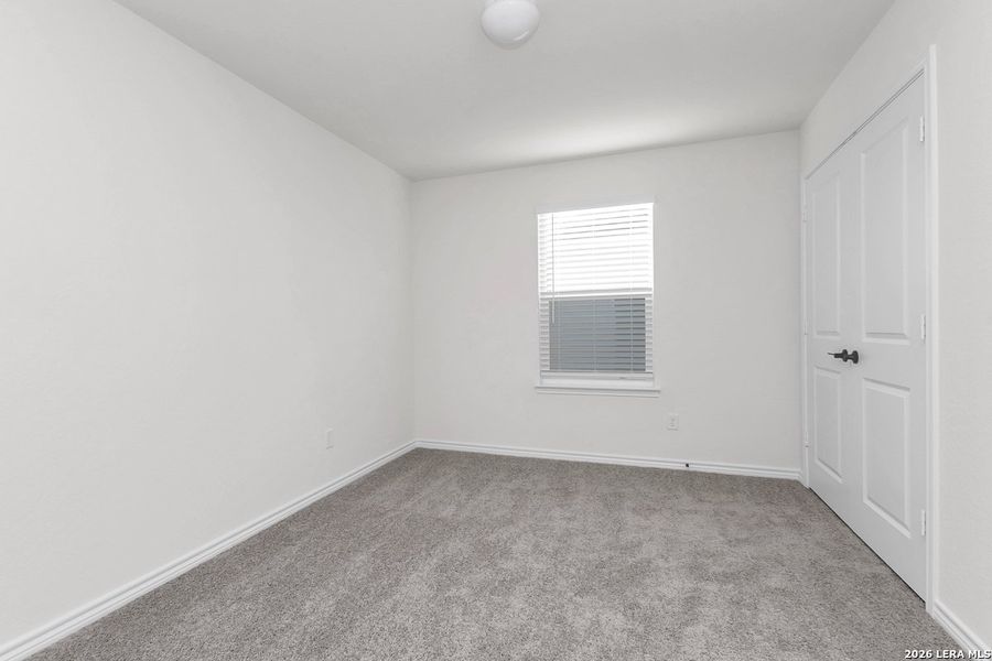Spacious, unfurnished interior of a new home in Preserve at Culebra - Heritage Collection, San Antonio (Image 10).