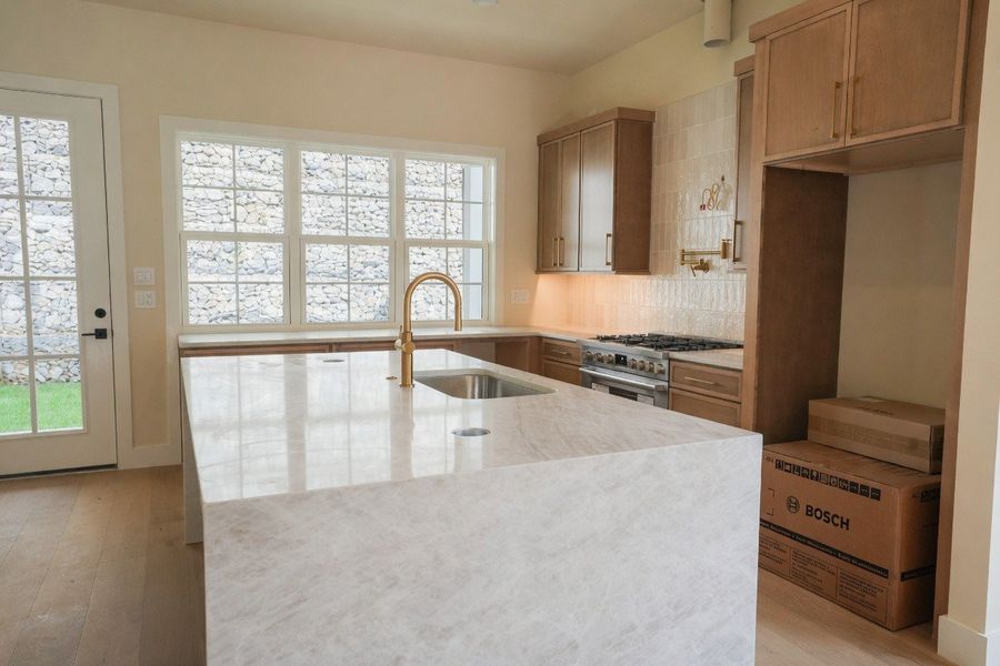 Furnished interior in a model home at Shadow Springs in Brentwood (Image 7).