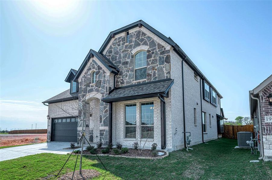 Front exterior of a new home in Meadow Vista, Anna, TX, highlighting curb appeal (Image 23).
