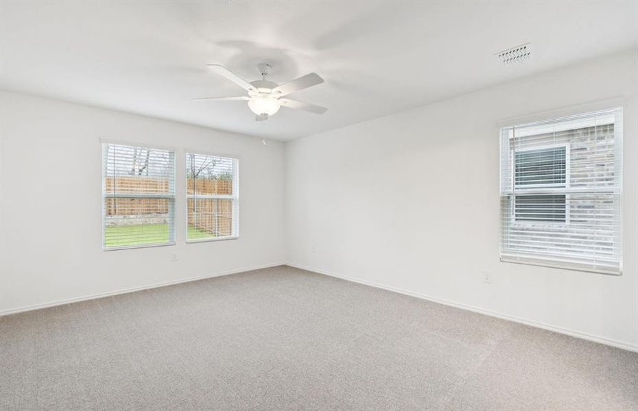 Spacious owner's suite with private bath