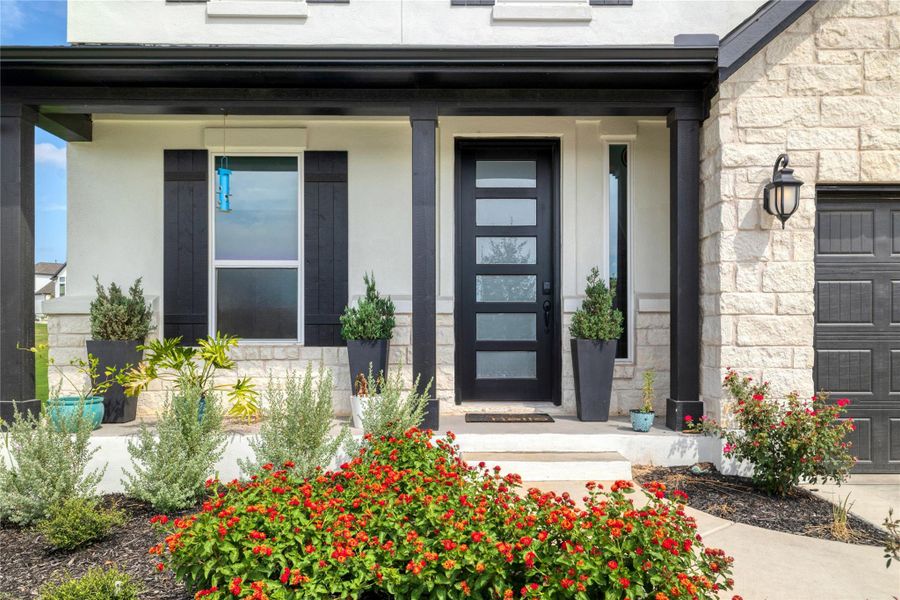 Front exterior of a new home in , Leander, TX, highlighting curb appeal (Image 2).