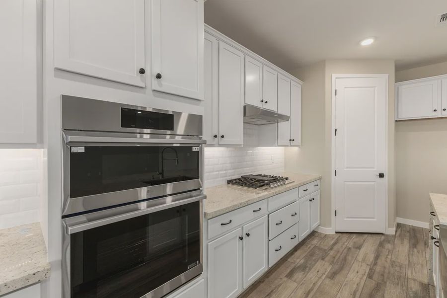 Furnished interior view inside a new home in Forté at Granite Vista, Waddell (Image 5).