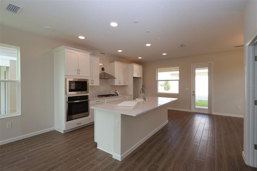 Furnished interior view inside a new home in Lake Star at Ovation, Winter Garden (Image 12).