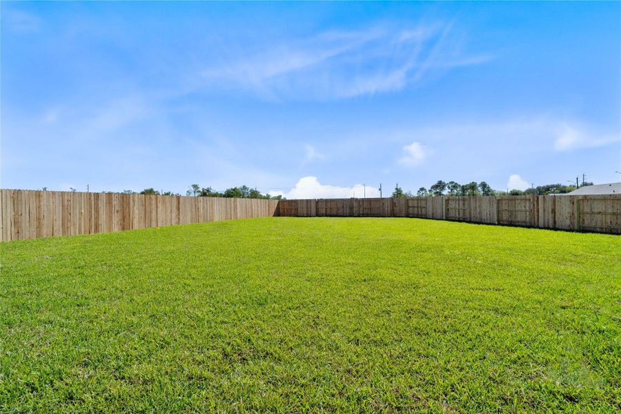 Generous oversized lot with abundant green space, perfect for outdoor activities!