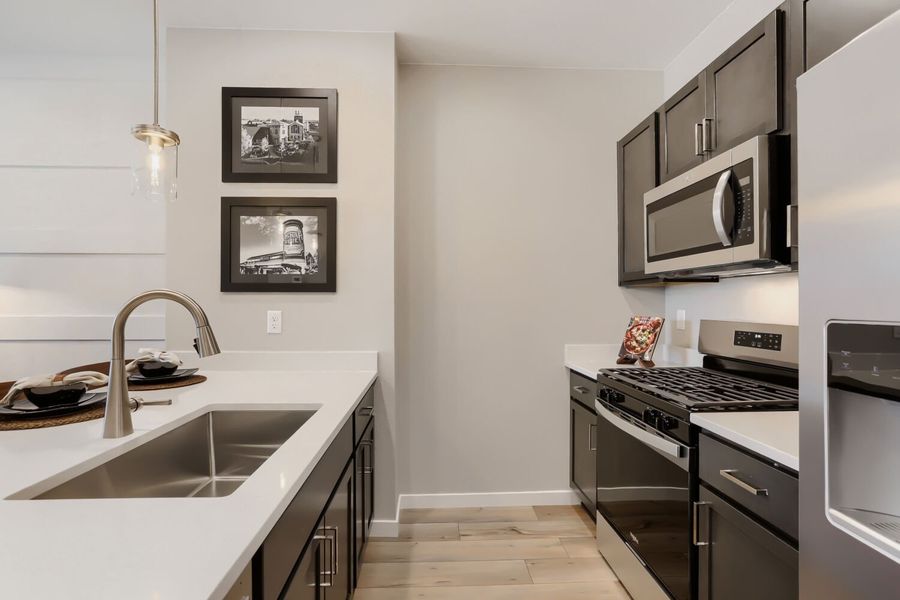 Representative furnished interior of a home built from the Novella One by Brookfield Residential in Barefoot, Firestone (Image 9).