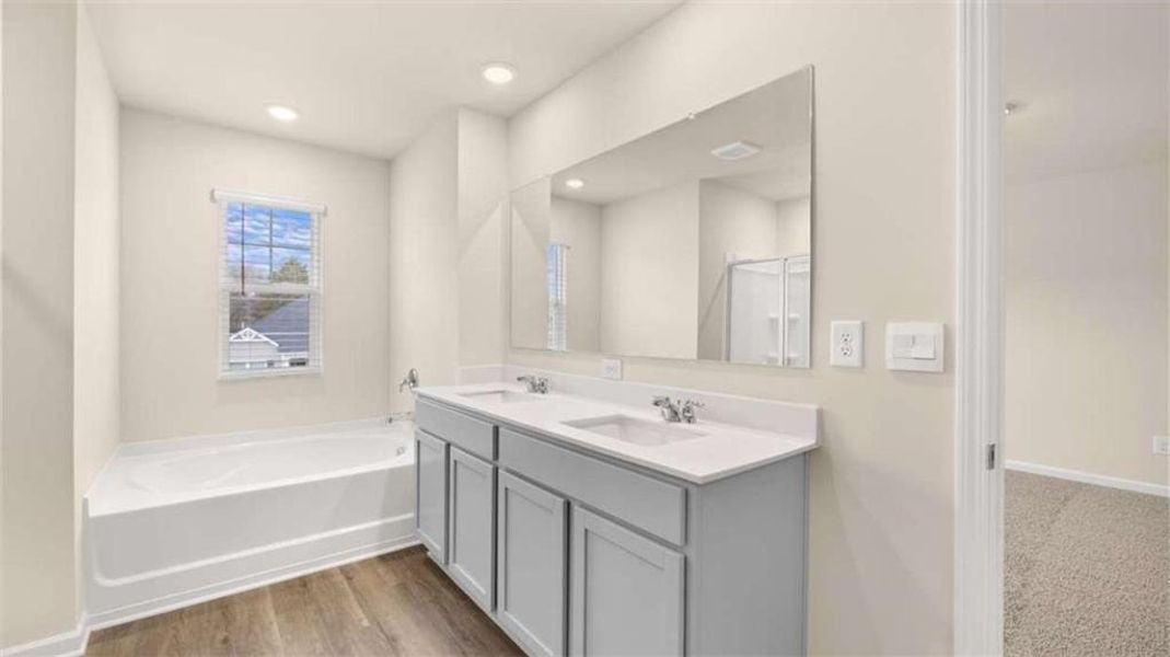 Furnished interior view inside a new home in The Preserve at Agricultural Village, Perry (Image 8).