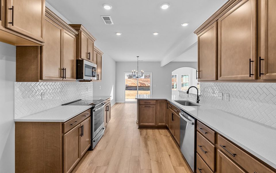 Furnished interior view inside a new home in Fieldstone, Lexington (Image 12).
