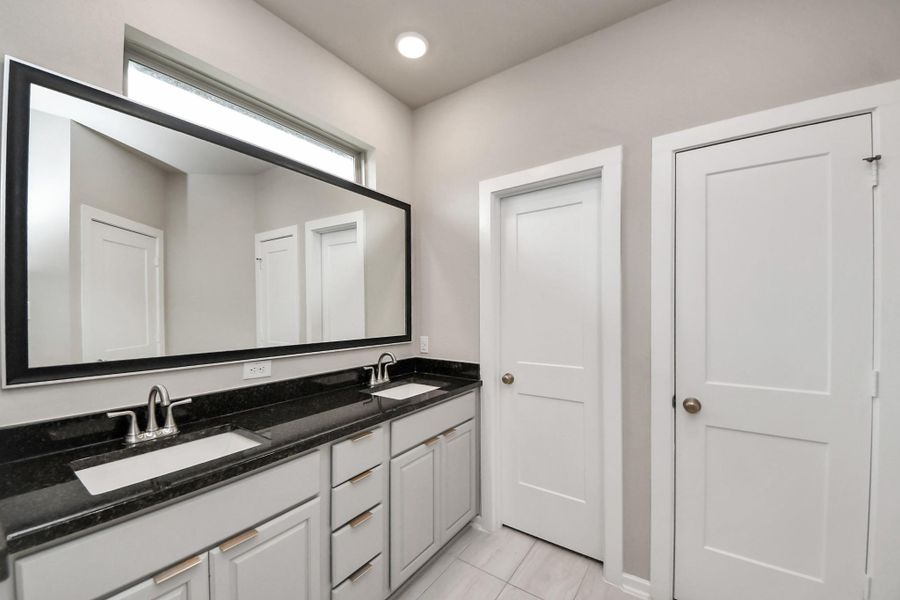 Furnished interior view inside a new home in The Groves, Humble (Image 12).