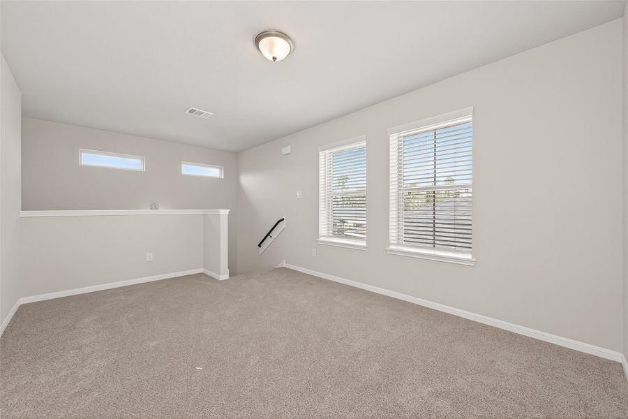 Spacious, unfurnished interior of a new home in Woodland Lakes, Houston (Image 36).