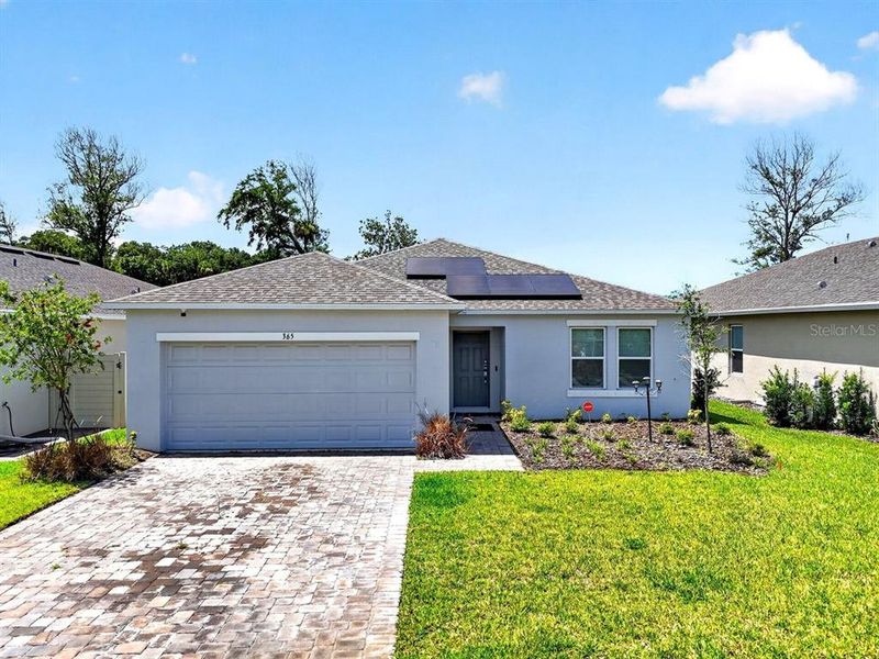 Front exterior of a new home in , Edgewater, FL, highlighting curb appeal (Image 21). Front exterior of a new home in , Edgewater, FL, highlighting curb appeal (Image 21).