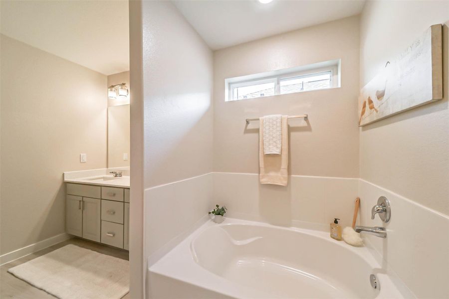 Photos are sample images from a previously built home with the same floor plan. Finishes and fixtures in the current home have been upgraded and may vary. Photos are sample images from a previously built home with the same floor plan. Finishes and fixtures in the current home have been upgraded and may vary.