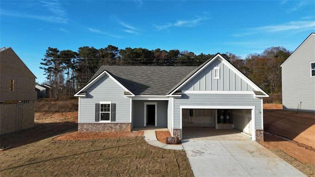Front exterior of a new home in Casteel, Bethlehem, GA, highlighting curb appeal (Image 2).