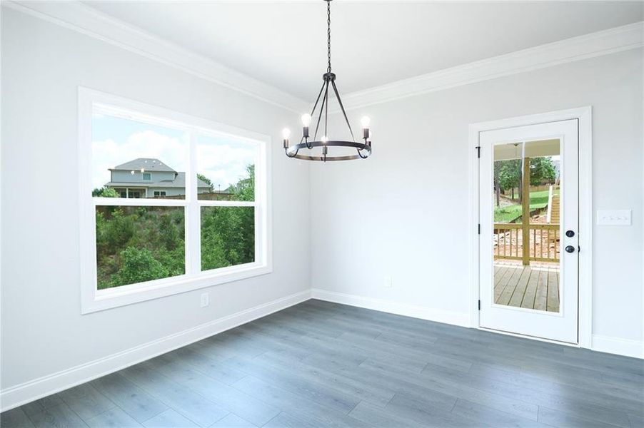 Spacious, unfurnished interior of a new home in Calgary Downs, Winder (Image 9).